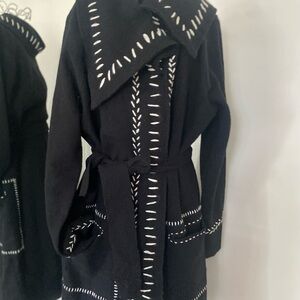 Stylish Black Women's Coat with White Stitching